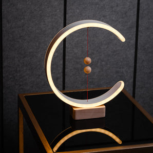 Interior Lamp with Magnetic Switches and Crescent-Shaped Glow
